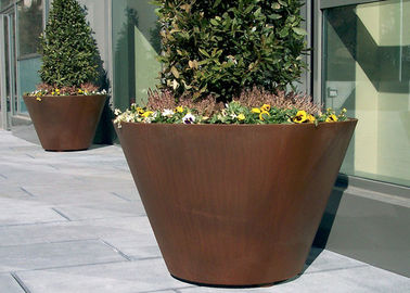 Un buen precio. Diversos tamaños/colores del plantador redondo de acero tradicional grande de Corten disponibles en línea