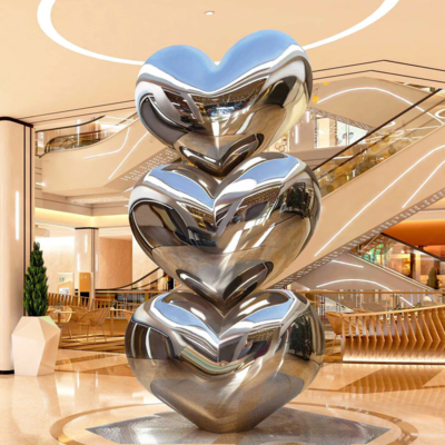 Un buen precio. Decoración de hoteles Espejo acabado Corazón apilado Escultura de acero inoxidable en línea