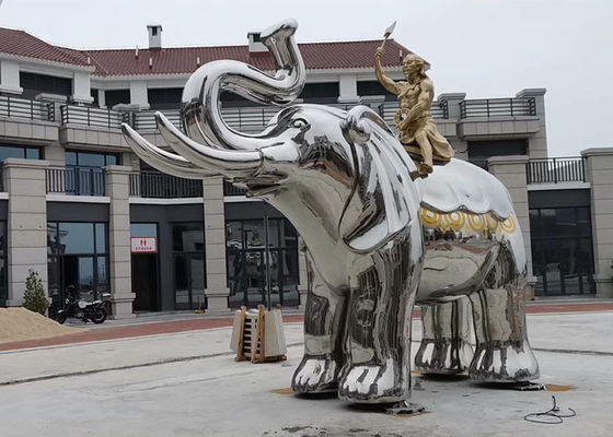 Un buen precio. Hombre de cobre amarillo de tamaño natural que sienta la escultura de acero inoxidable del elefante en línea